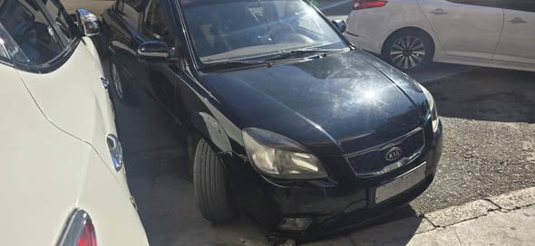 كيا ريو 2010 - صورة 1