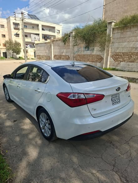 كيا كي 3 2013 - صورة 2