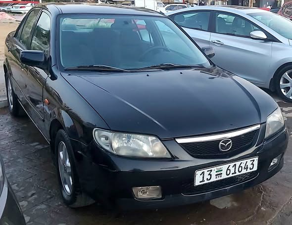مازدا 323 2002 - صورة 2