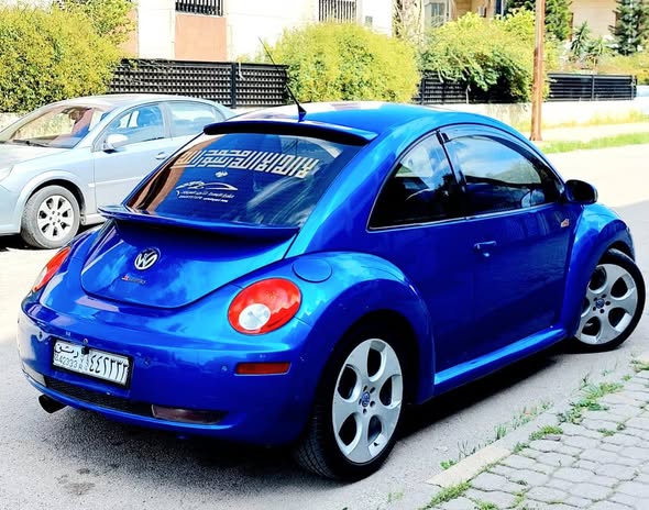 فولكس فاغن بيتل 2004 - صورة 2