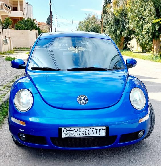 فولكس فاغن بيتل 2004 - صورة 4