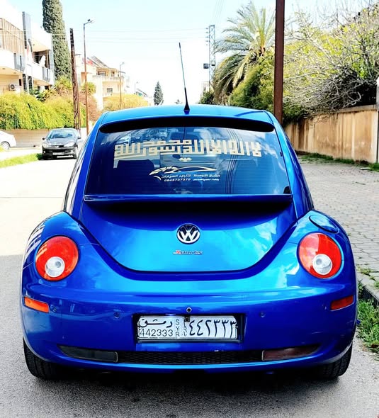 فولكس فاغن بيتل 2004 - صورة 5