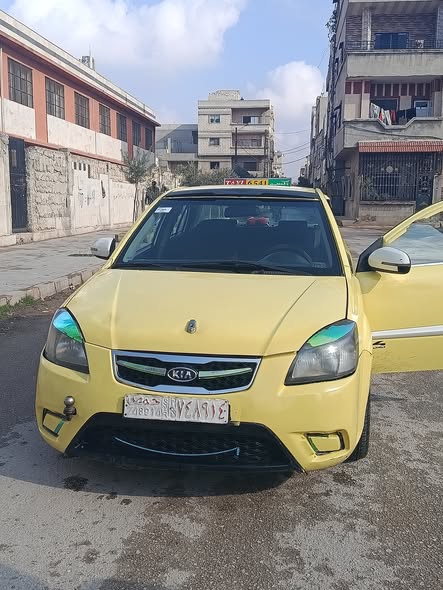 كيا ريو 2011 - صورة 1
