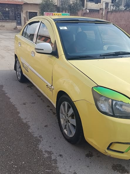 كيا ريو 2011 - صورة 3