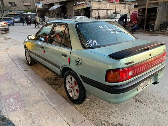 مازدا 323 1993 - صورة 4