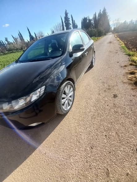 كيا فورتي 2010 - صورة 1