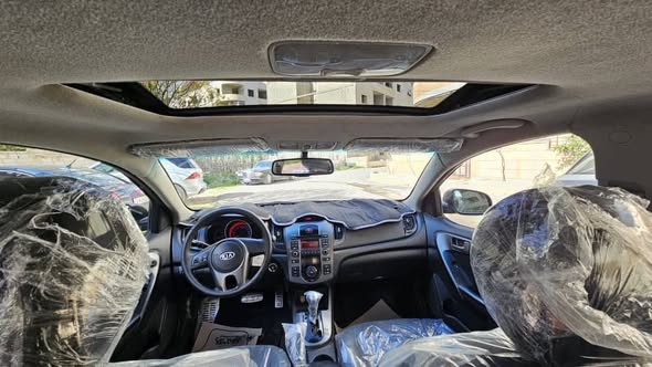 كيا سيراتو 2011 - صورة 2