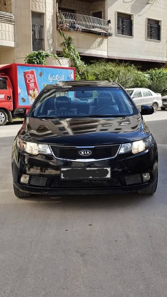 كيا سيراتو 2011 - صورة 3