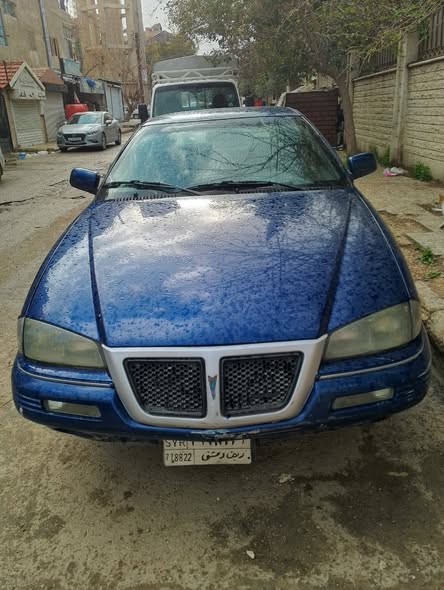 بونتياك جراند أم 1991 - صورة 1