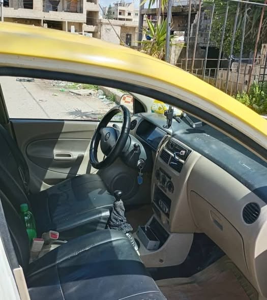 دايهاتسو شاراد 2006 - صورة 1