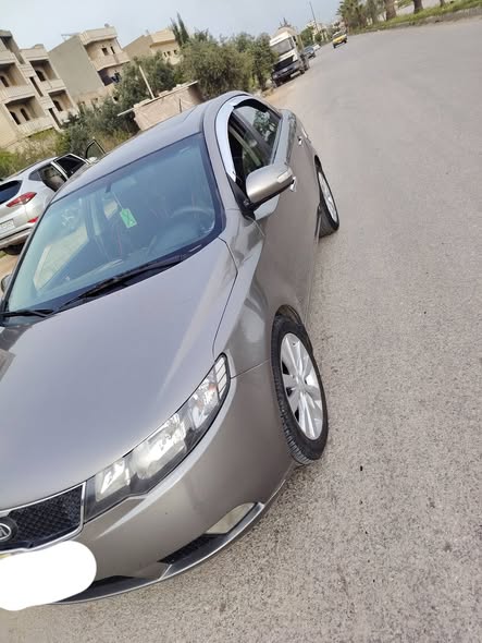 كيا فورتي 2010 - صورة 4