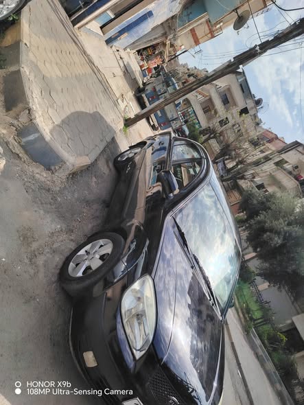 كيا ريو 2006 - صورة 2