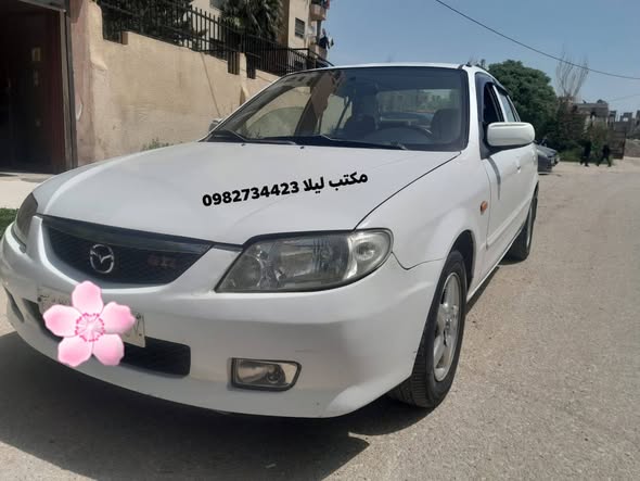 مازدا 323 2002 - صورة 3