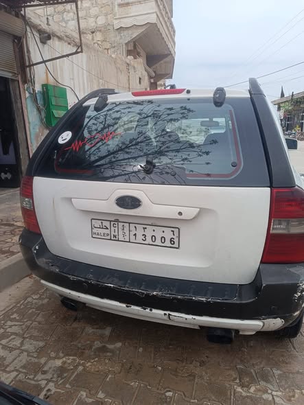 كيا سبورتاج 2005 - صورة 3