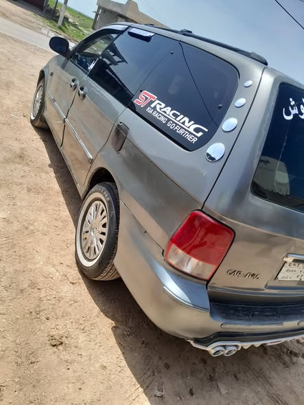 كيا كرنفال 2004 - صورة 1