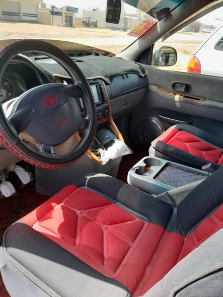 كيا كرنفال 2004 - صورة 3