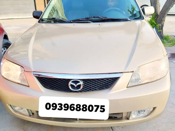 مازدا 323 2003 - صورة 1