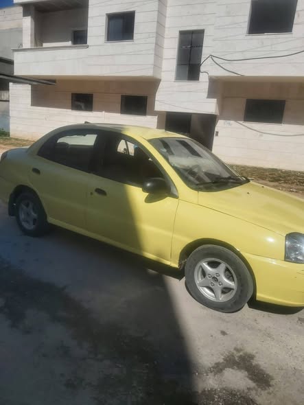 كيا ريو 2001 - صورة 5
