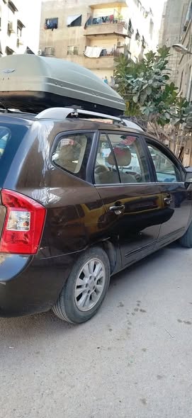 كيا كارينز 2013 - صورة 2