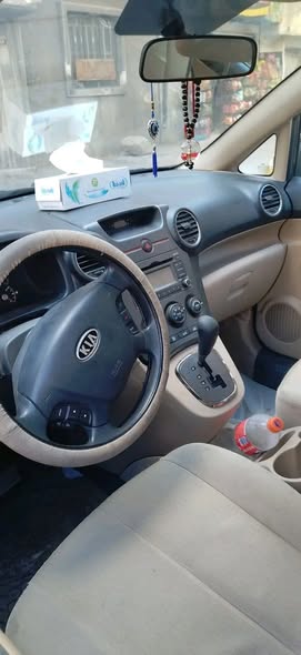 كيا كارينز 2013 - صورة 4