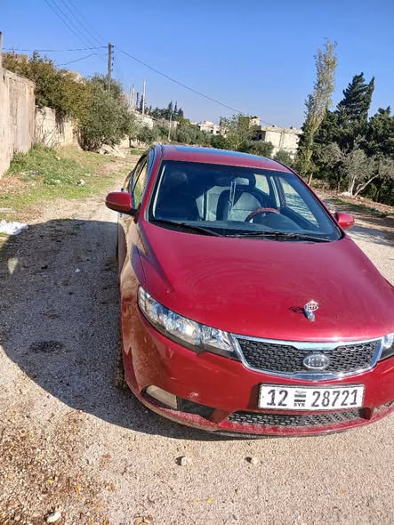 كيا سيراتو 2012 - صورة 4