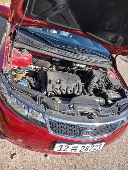 كيا سيراتو 2012 - صورة 5