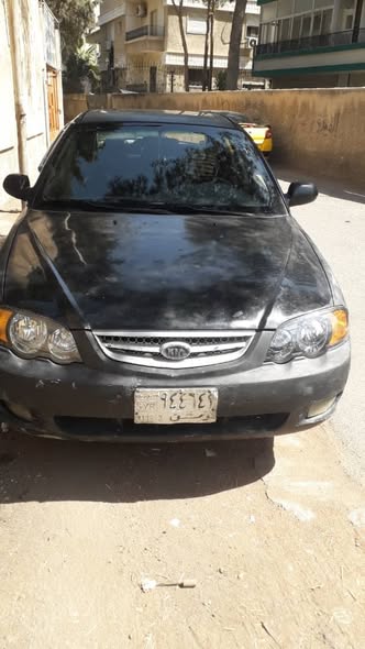 كيا شوما 2005 - صورة 2