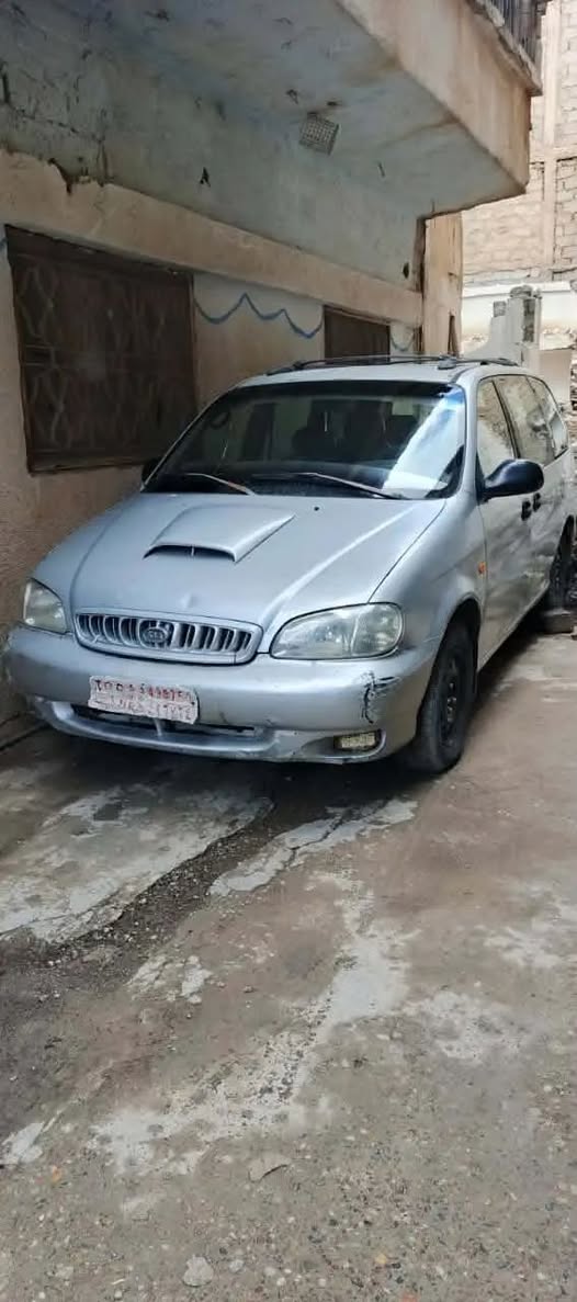 كيا كرنفال 2002