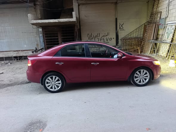 كيا فورتي 2010 - صورة 5