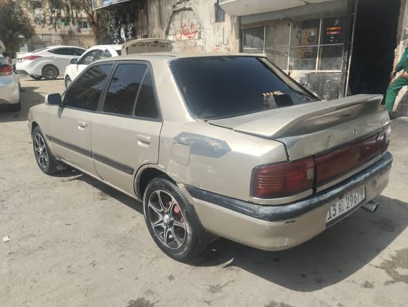 مازدا 323 1993 - صورة 3