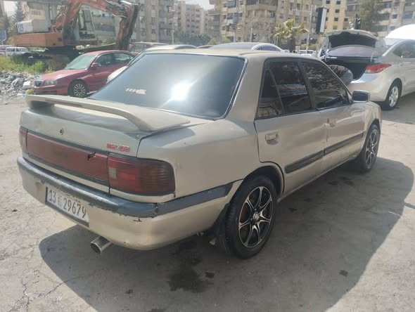 مازدا 323 1993 - صورة 4