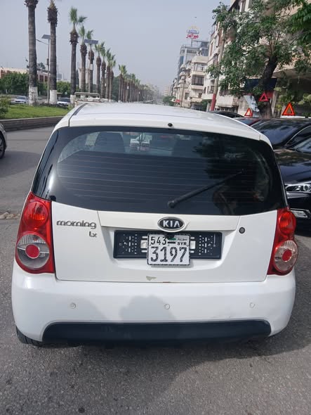 كيا مورنيغ 2011 - صورة 4