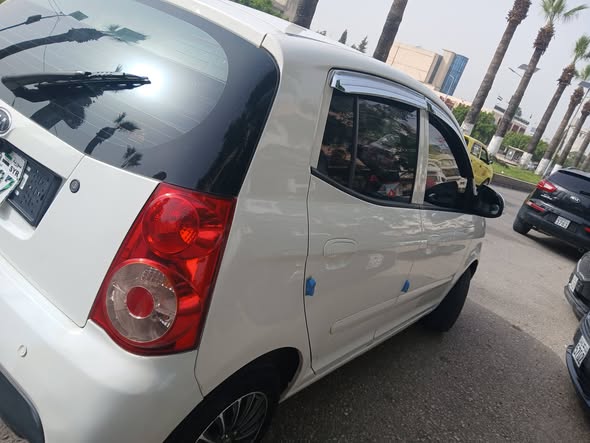 كيا مورنيغ 2011 - صورة 5