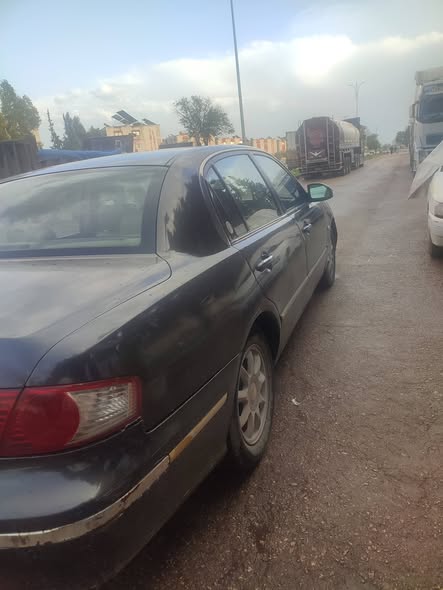 كيا أوبتيما 2006 - صورة 4