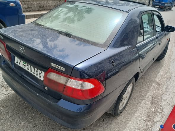 مازدا 323 2002 - صورة 2