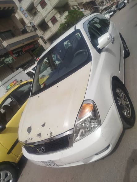 كيا كرنفال 2013 - صورة 3