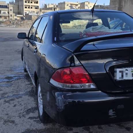 ميتسوبيشي لانسر 2004 - صورة 2