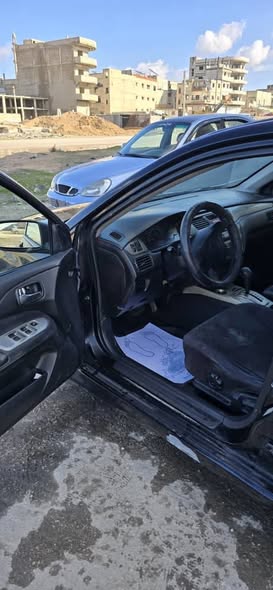 ميتسوبيشي لانسر 2004 - صورة 4