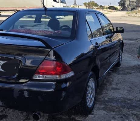 ميتسوبيشي لانسر 2004 - صورة 5