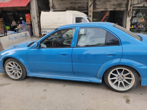 متسوبيشي لانسر 1998 - صورة 2