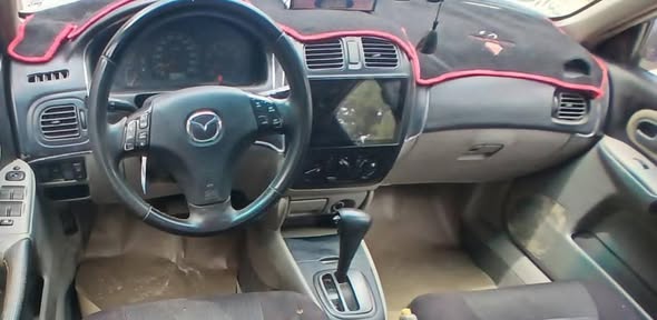 مازدا 323 2002 - صورة 1