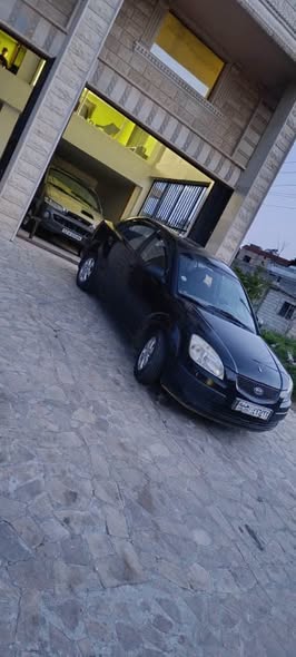 كيا ريو 2009 - صورة 5