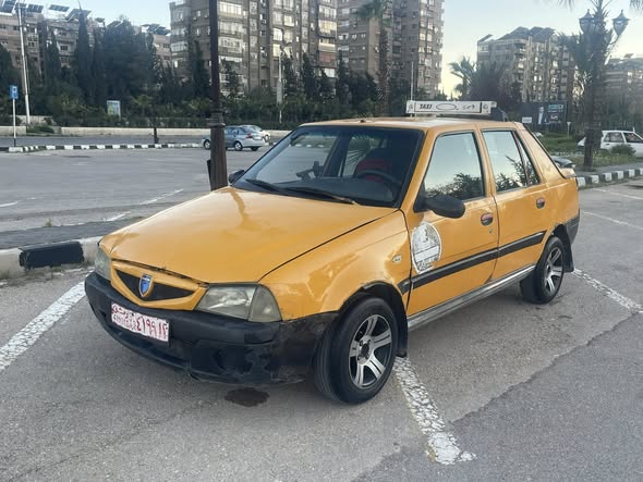 داسيا سولنزا 2004 - صورة 2