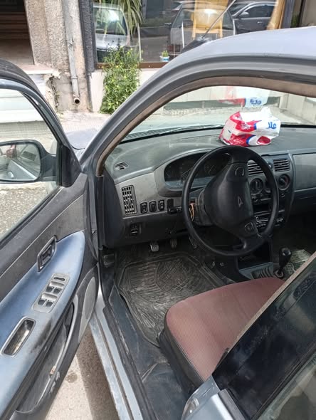 دايهاتسو سيريون 2004 - صورة 1