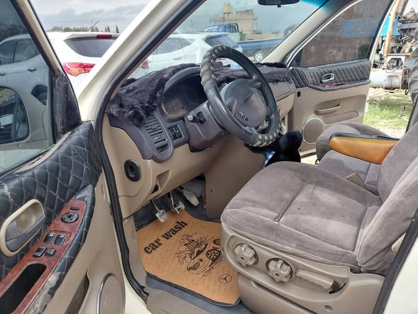 كيا كرنفال 2001 - صورة 5