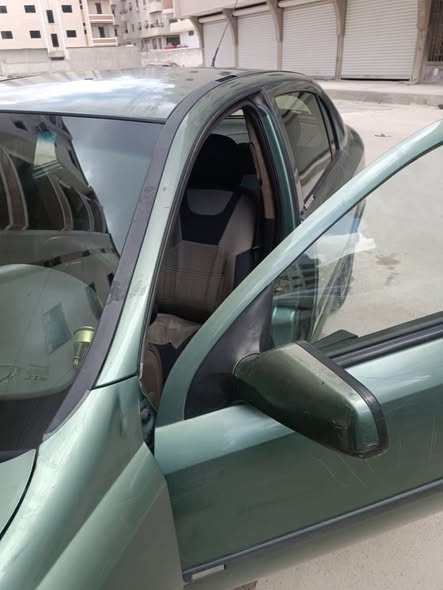 أوبل أسترا 1998 - صورة 5