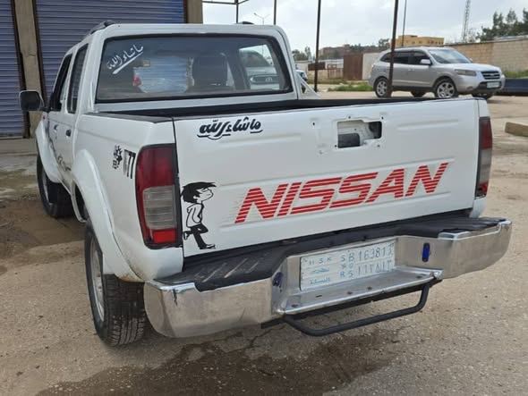 نيسان بيك أب 2000 - صورة 1