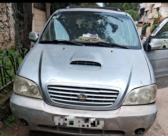 كيا كرنفال 2002 - صورة 3