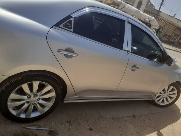 كيا فورتي 2009 - صورة 3