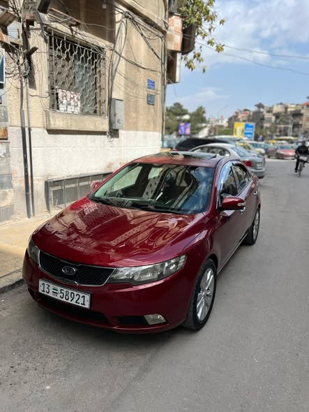 كيا فورتي 2009 - صورة 1